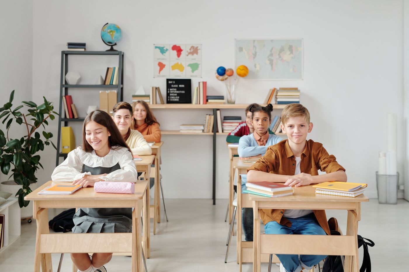Students sitting at desks in a classroom.